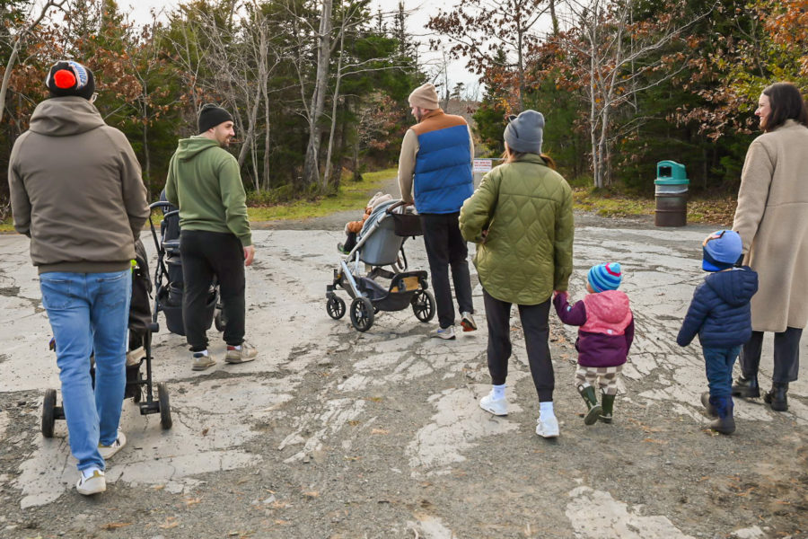 Adults and children entering Point Pleasant Park in Halifax, NS