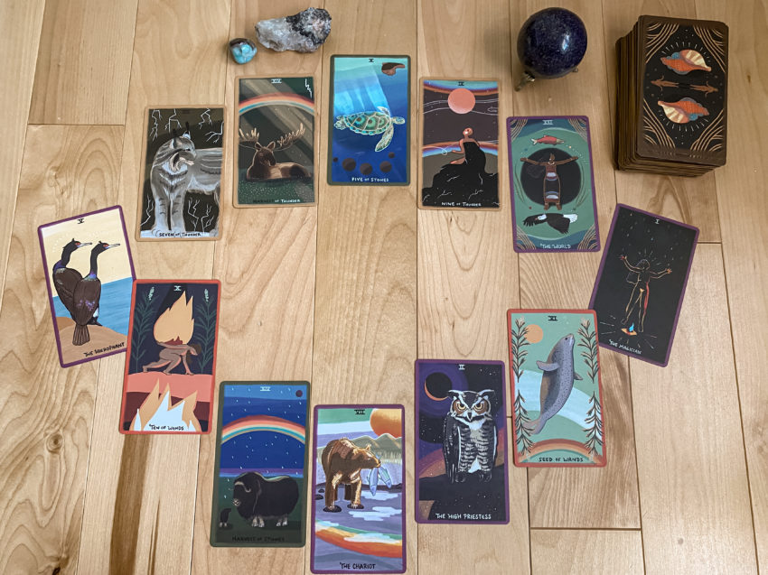 12 tarot cards lay face up, one for each month of the year