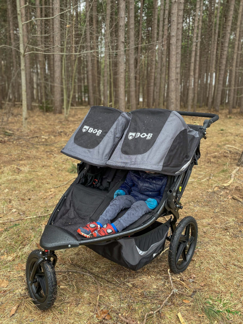 A BOB double jogging stroller in the woods