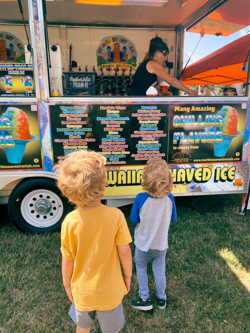 two boys wait for shaved ice at valley rib fest